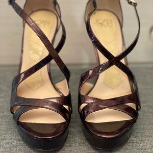Brand new Joan & David patent leather platform heels. Brown color. Size 7